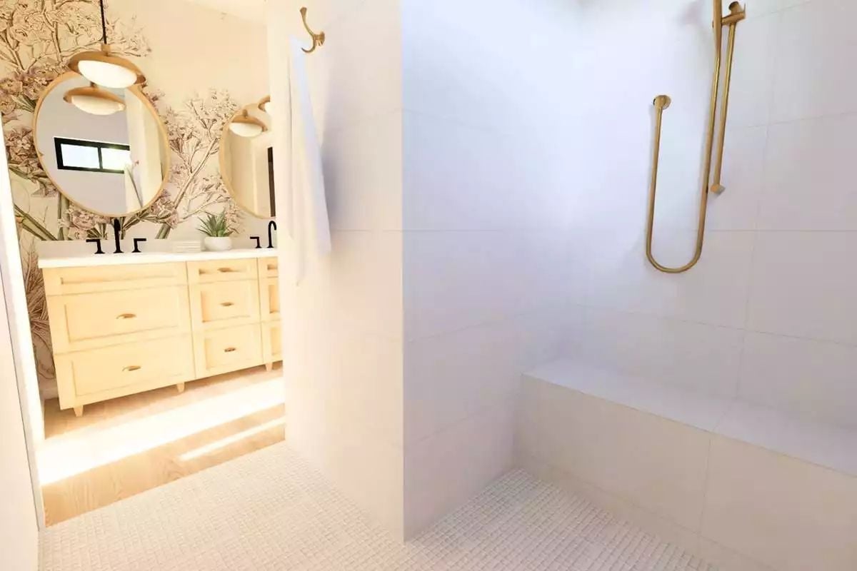Gold Fixtures and White Tile Keep the Shower Honest Without Being Boring