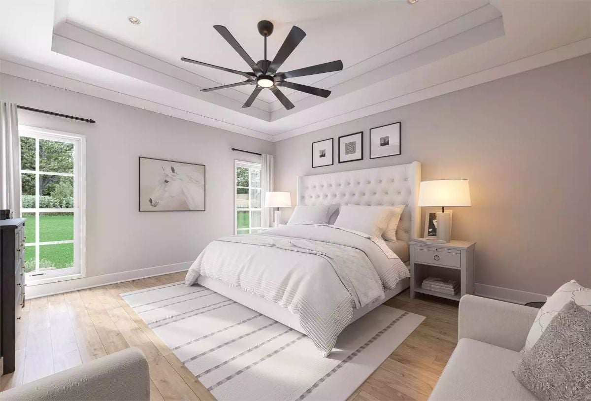 Seven-Blade Fan and a Tray Ceiling That Give This Bedroom Real Presence