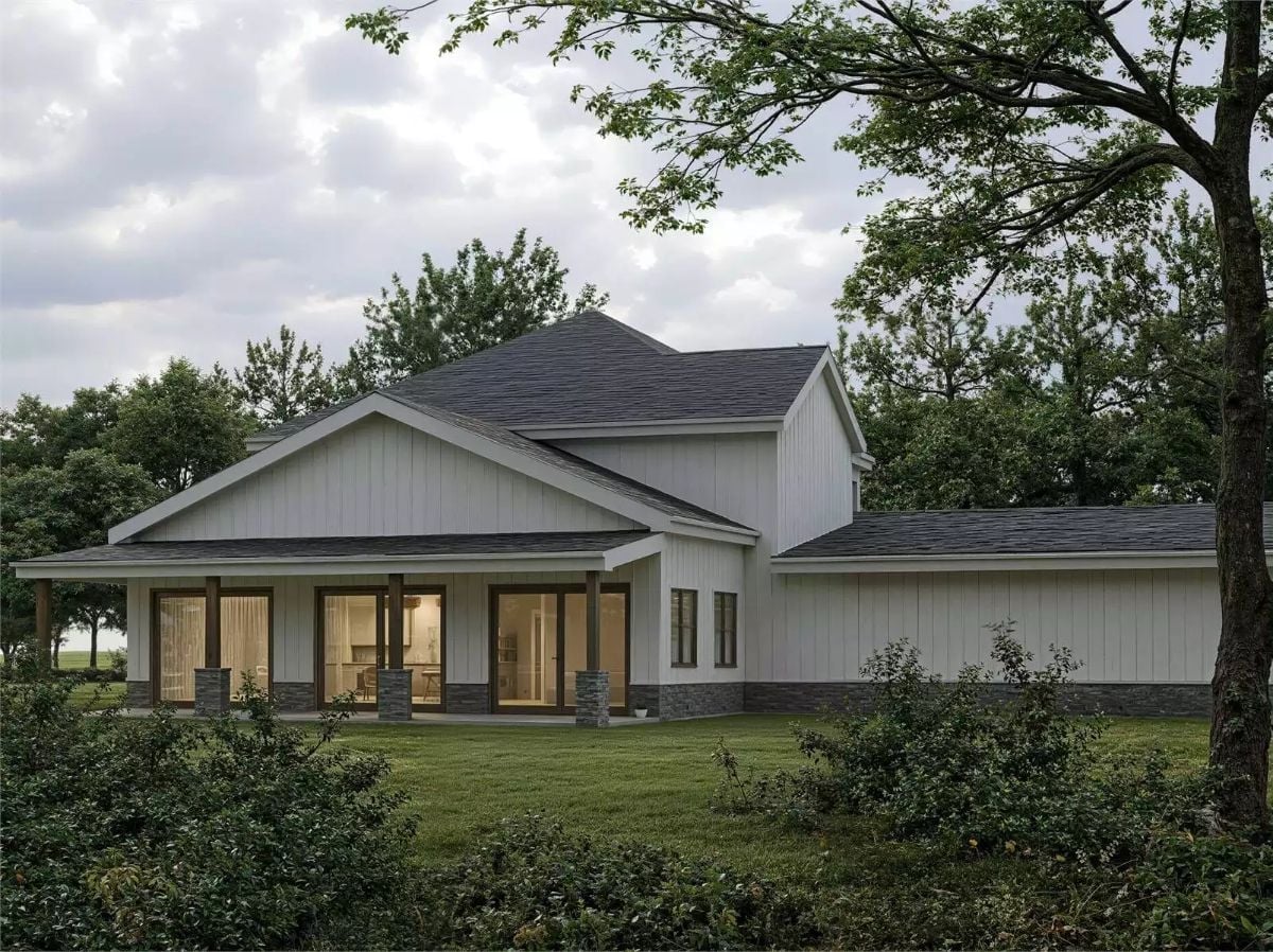 Covered Rear Porch With Floor-to-Ceiling Glass Pulls the Outdoors Straight In