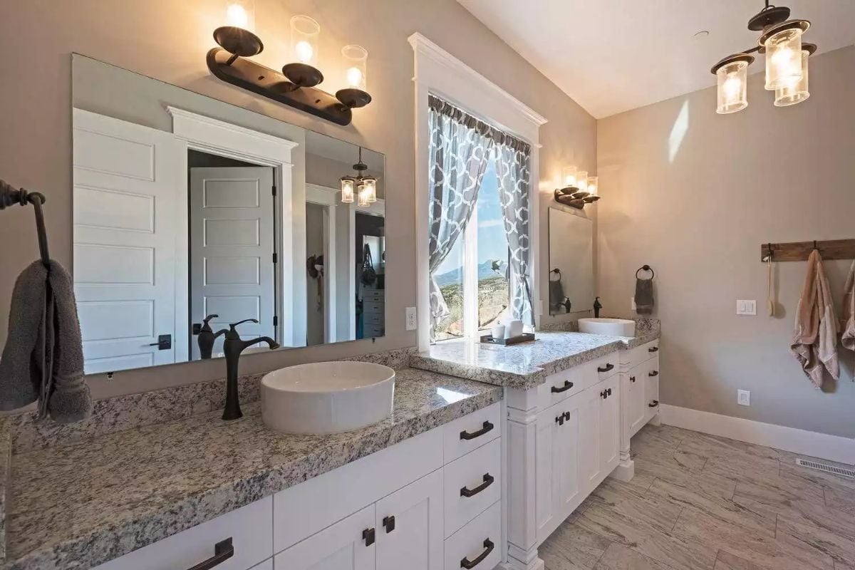 Vessel Sinks, Dark Hardware, and a Window That Borrows the Mountain