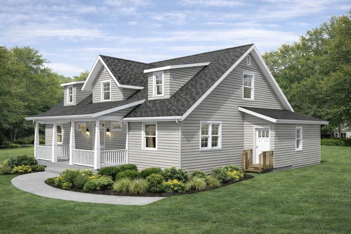Gray Lap Siding and Dormers Give This Cape Cod Its Quiet, Classic Character