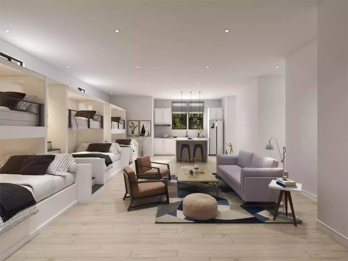 Bunk Walls and a Kitchen Island in One Room — Carriage House Logic at Its Best