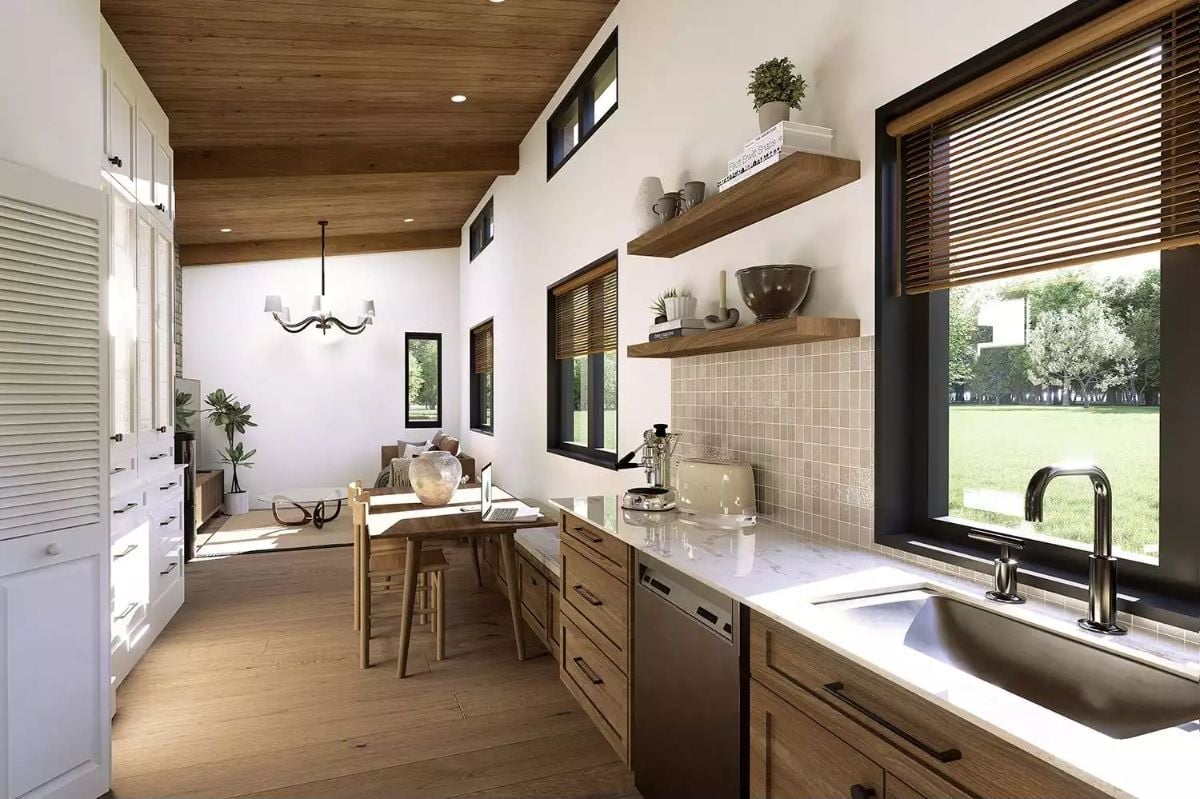 Floating Shelves, Marble Counters, and a Kitchen That Opens Into Everything
