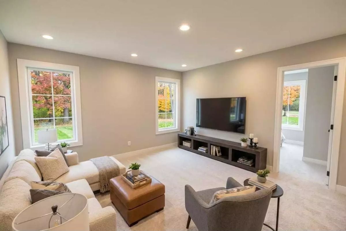 Greige Walls and a Low TV Console Make This Loft Feel Like It Was Always There