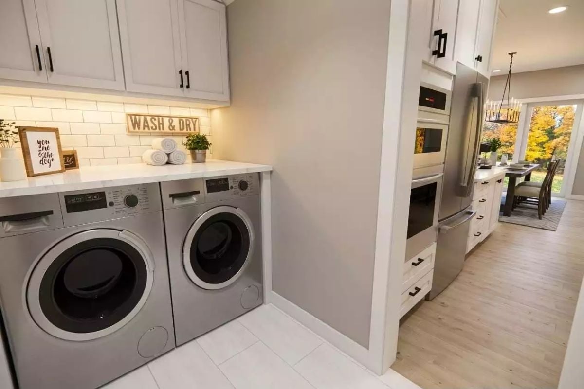 Side-by-Side Front-Load Machines Built Into a Counter Make Laundry Feel Less Like a Chore