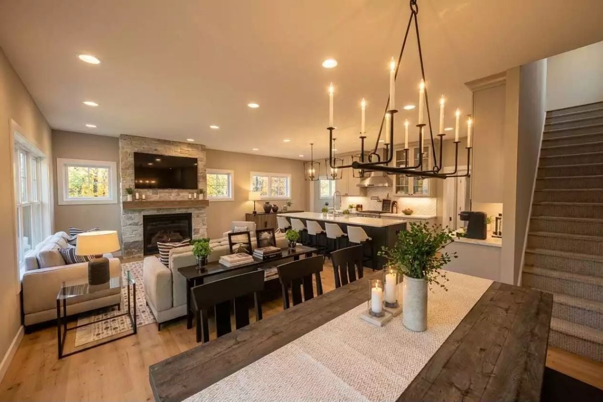 Candlelit Chandelier Over a Farmhouse Table Sets the Tone Before Dinner Starts