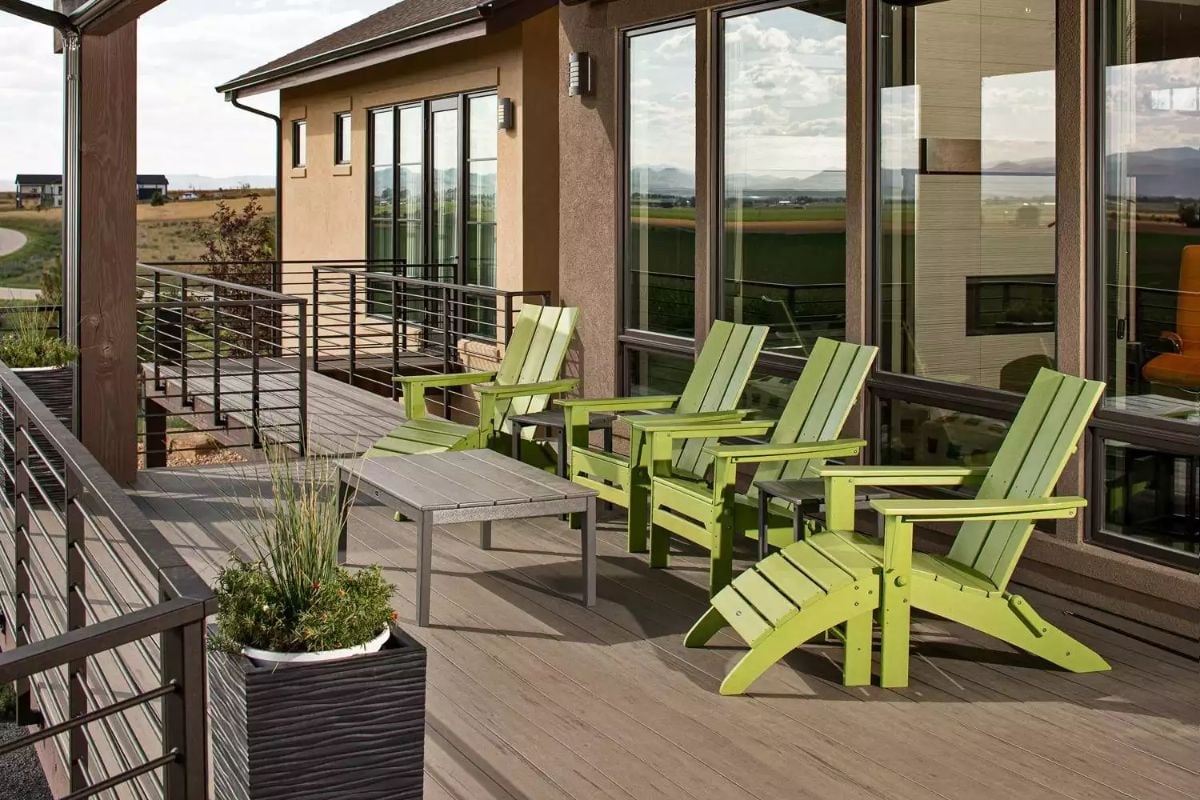 Lime Green Adirondack Chairs on a Composite Deck With Mountain Views Behind Them