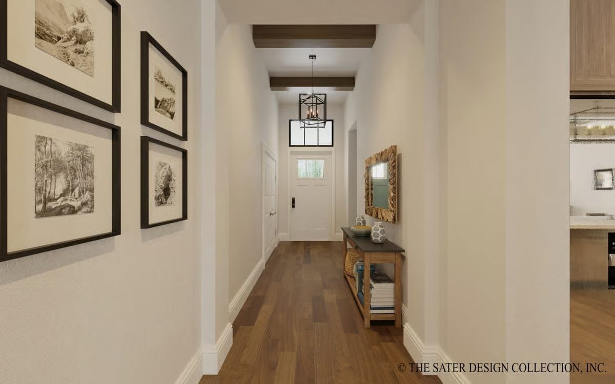 Framed Sketches and Exposed Beams Make This Foyer Worth Slowing Down In