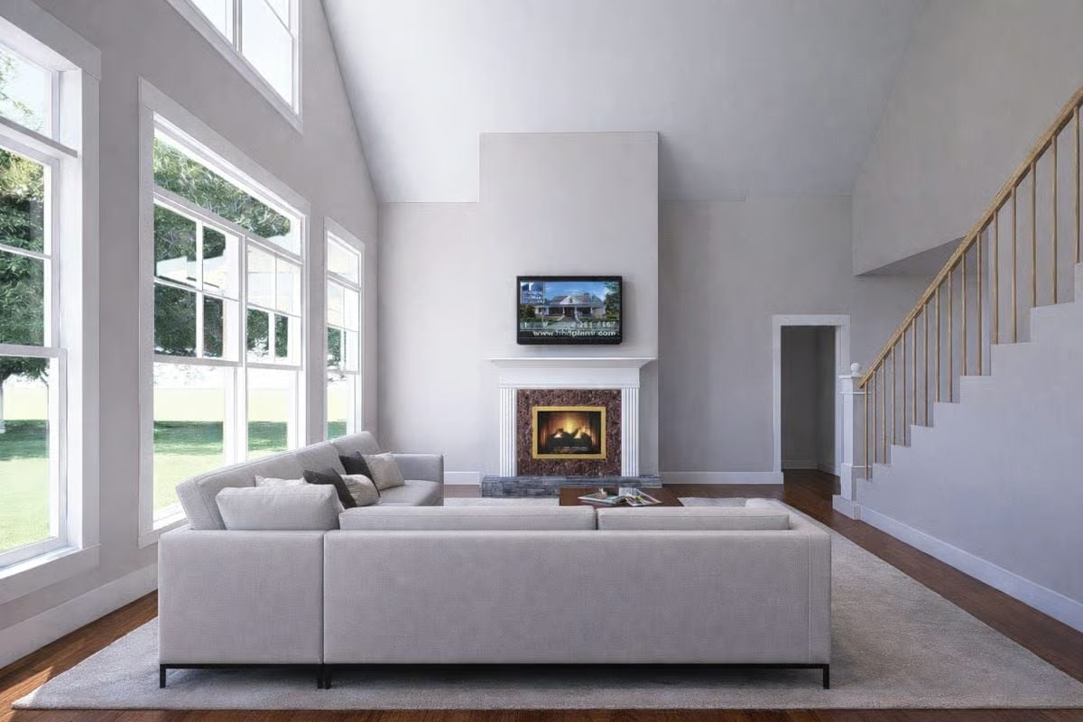 Vaulted Ceilings and a Live Fire Make This Living Room Hard to Leave