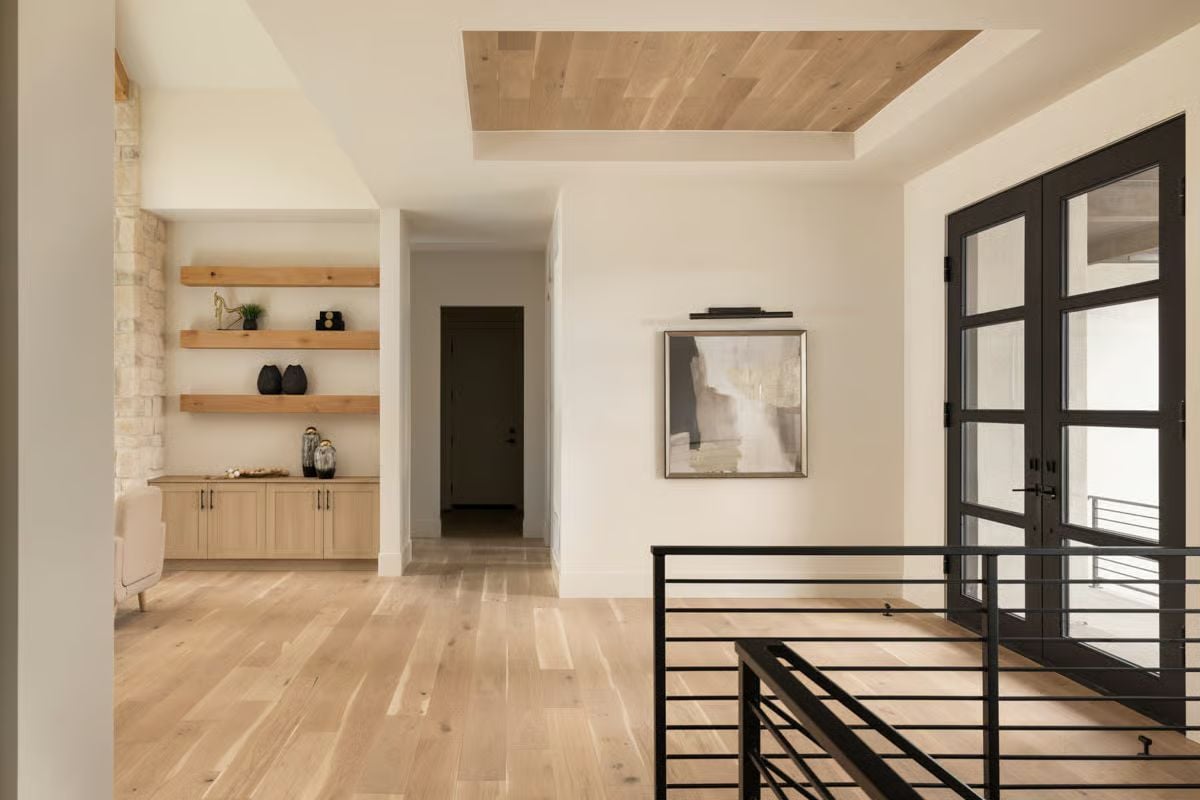 Floating Shelves and a Wood Ceiling Inset Pull This Upper Hall Together
