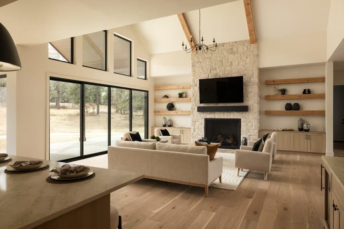 Vaulted Ceilings and Stone Keep This Living Room Grounded