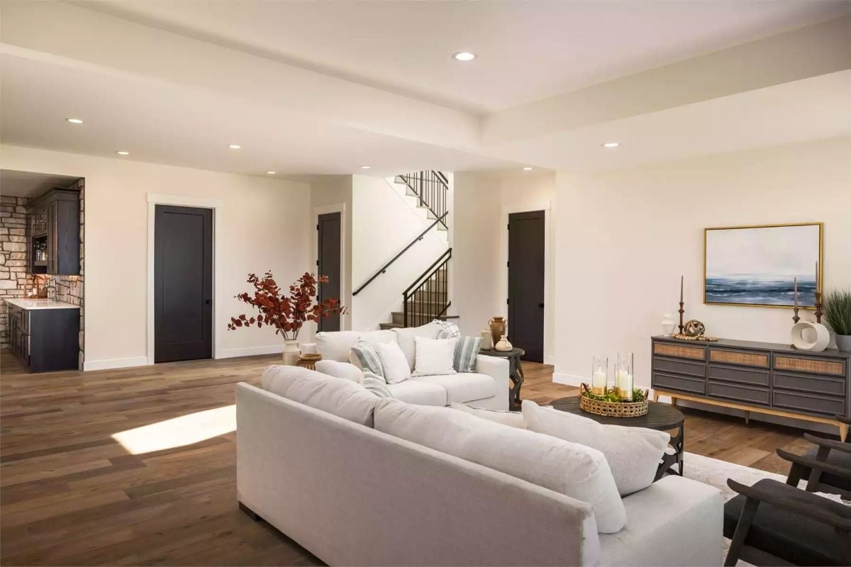 Cream Sofas, Black Doors, and a Staircase That Reminds You Someone Might Actually Come Home