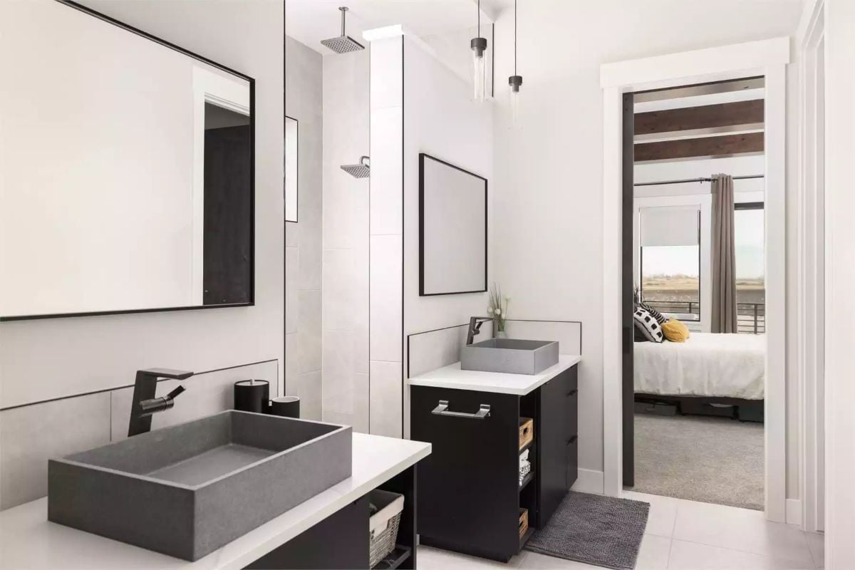 Concrete Vessel Sinks and Black Hardware Make This Bathroom Mean Business