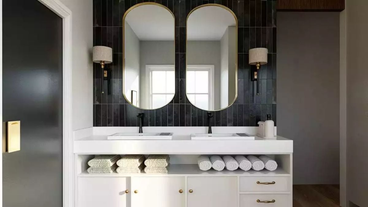 Gold-Framed Mirrors and Matte Black Faucets Sharing a Wall Without Fighting About It