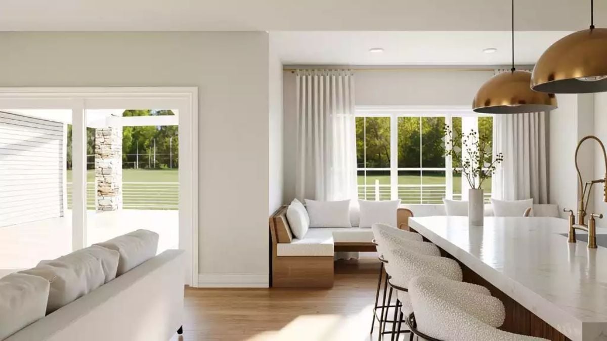 Gold Pendants and a Kitchen Island That Earns Its Real Estate