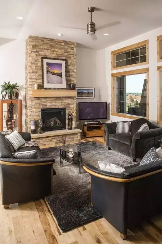 Stacked Stone to the Ceiling Earns Every Inch of That Wall