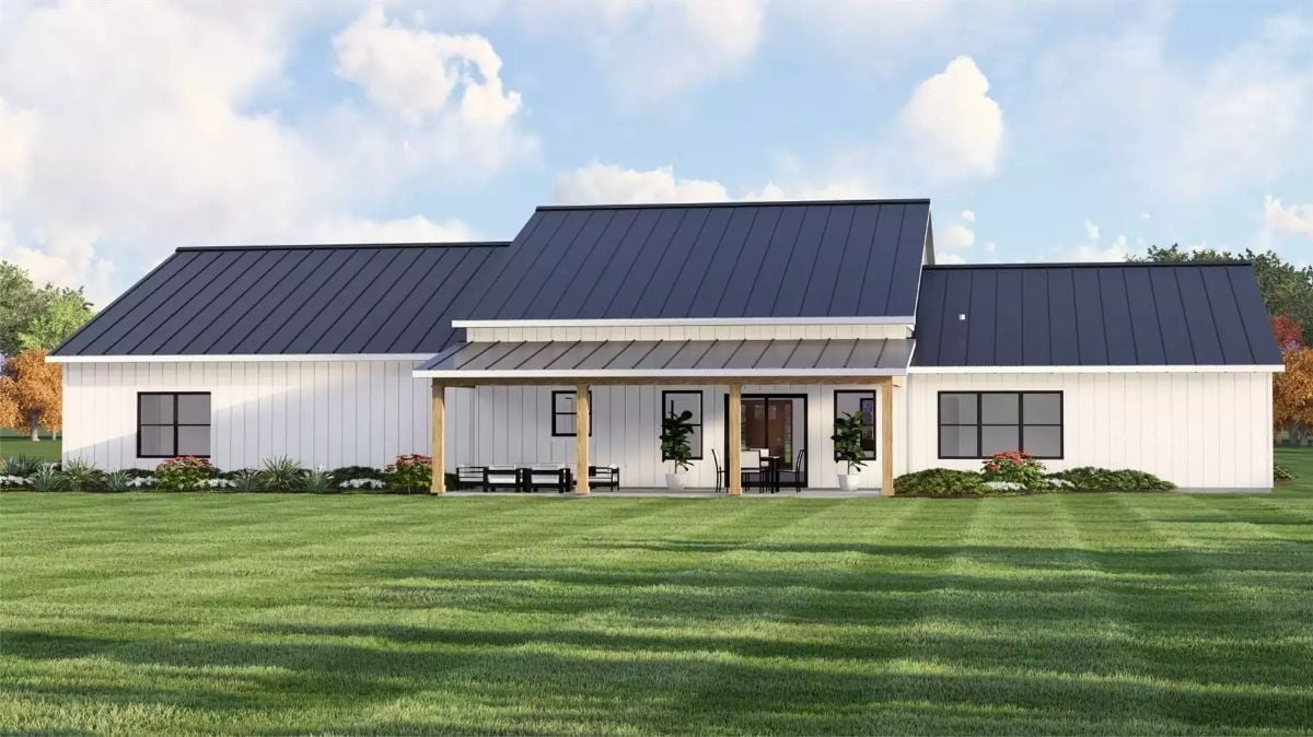 Dark Metal Roof, Wood Columns, and a Back Porch Built for Staying a While