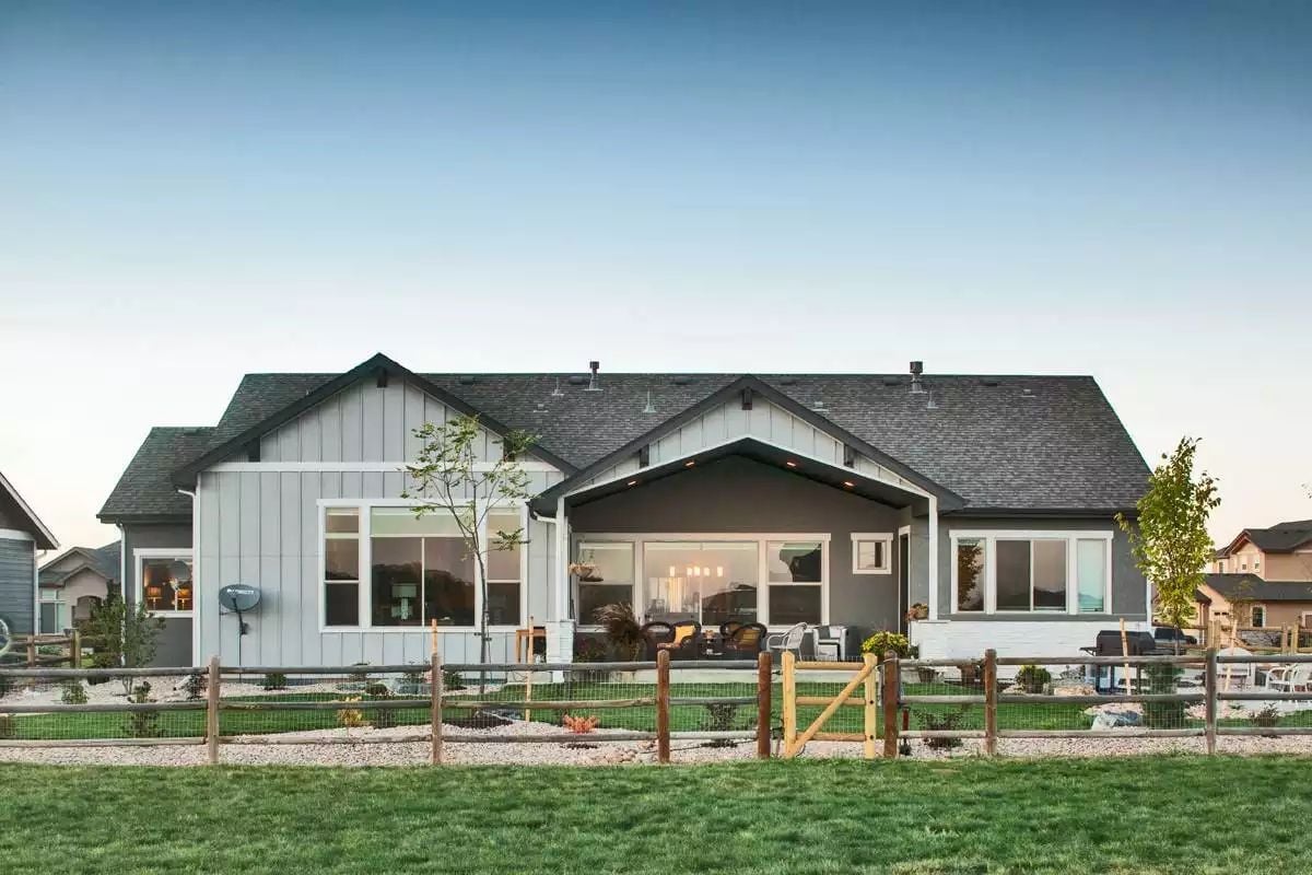 Board-and-Batten Exterior Built for Backyard Living at Dusk