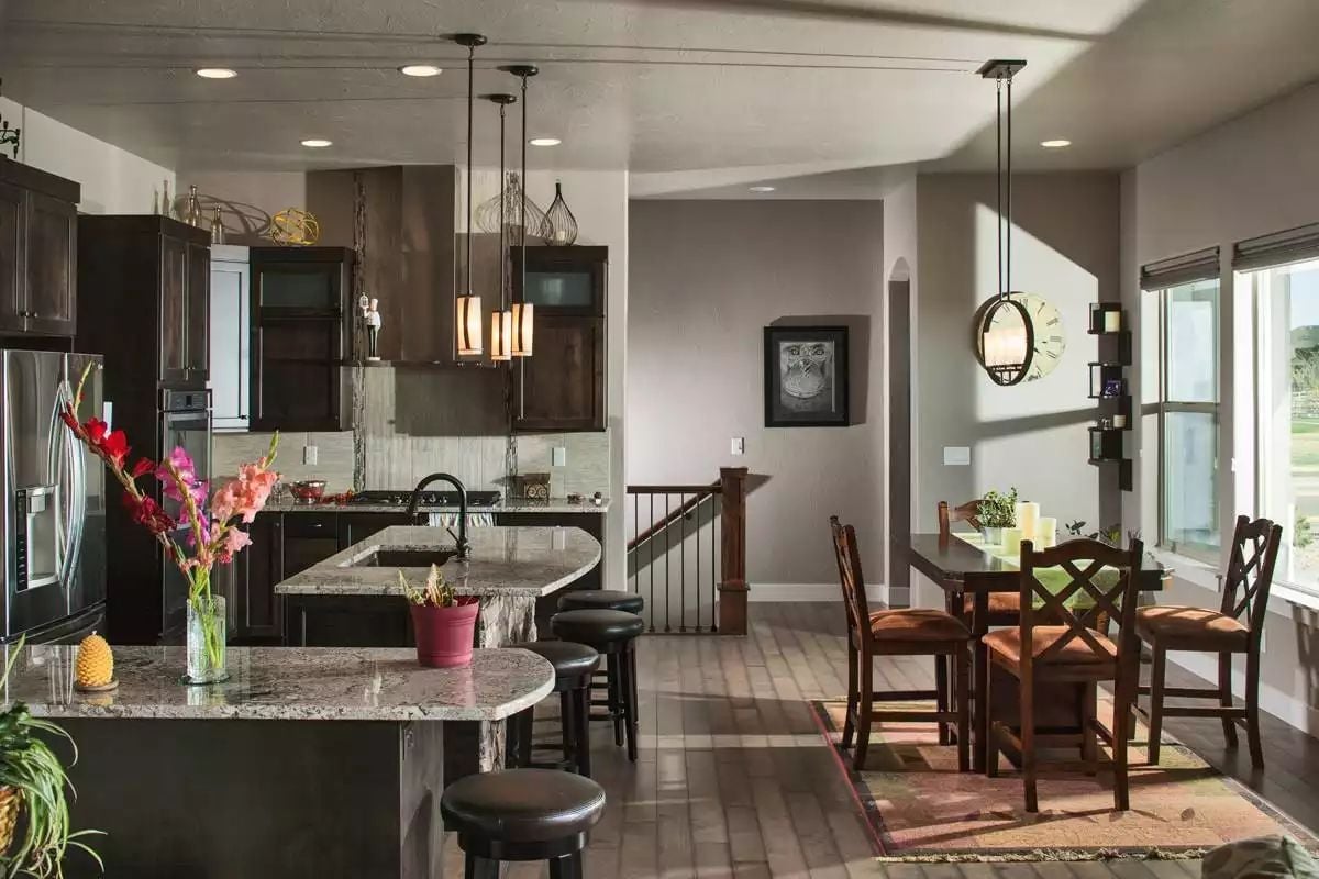 Dark Cabinets and Granite That Pull an Open Floor Plan Together