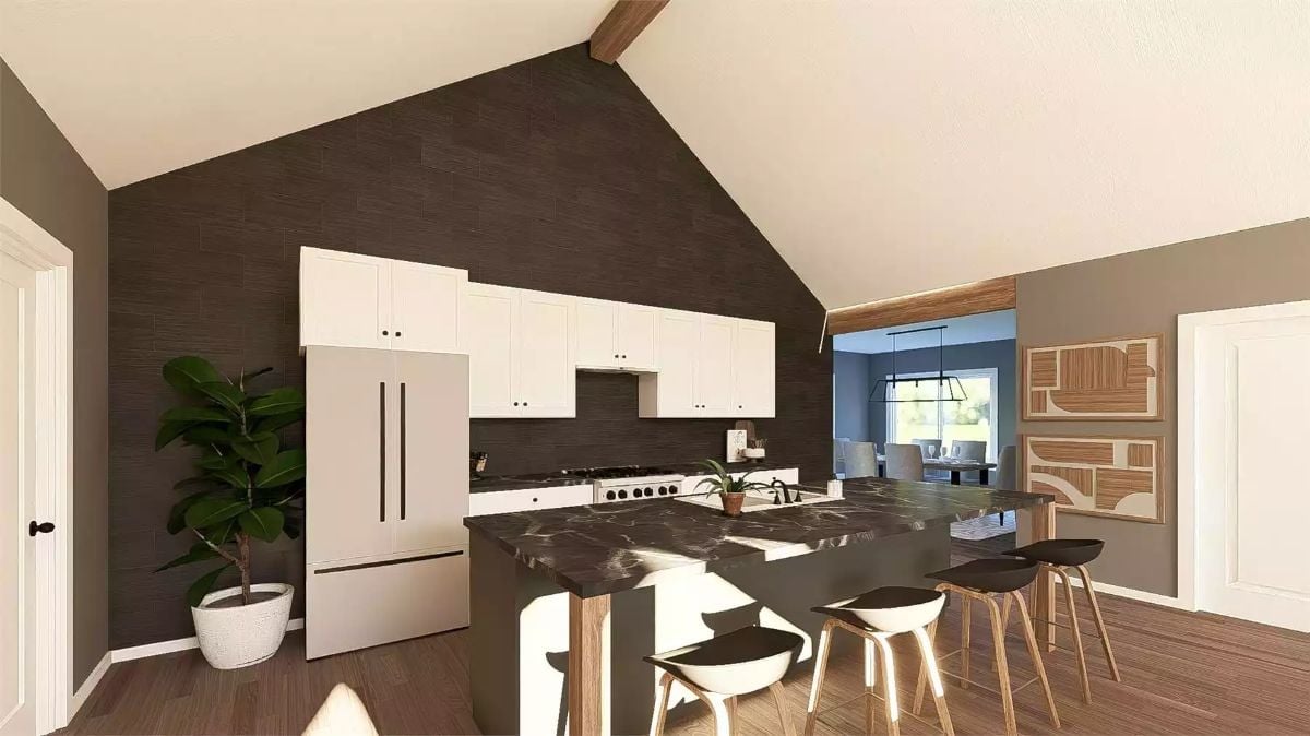 Dark Marble Waterfall Island in a Kitchen Built for Cooking, Not Staging
