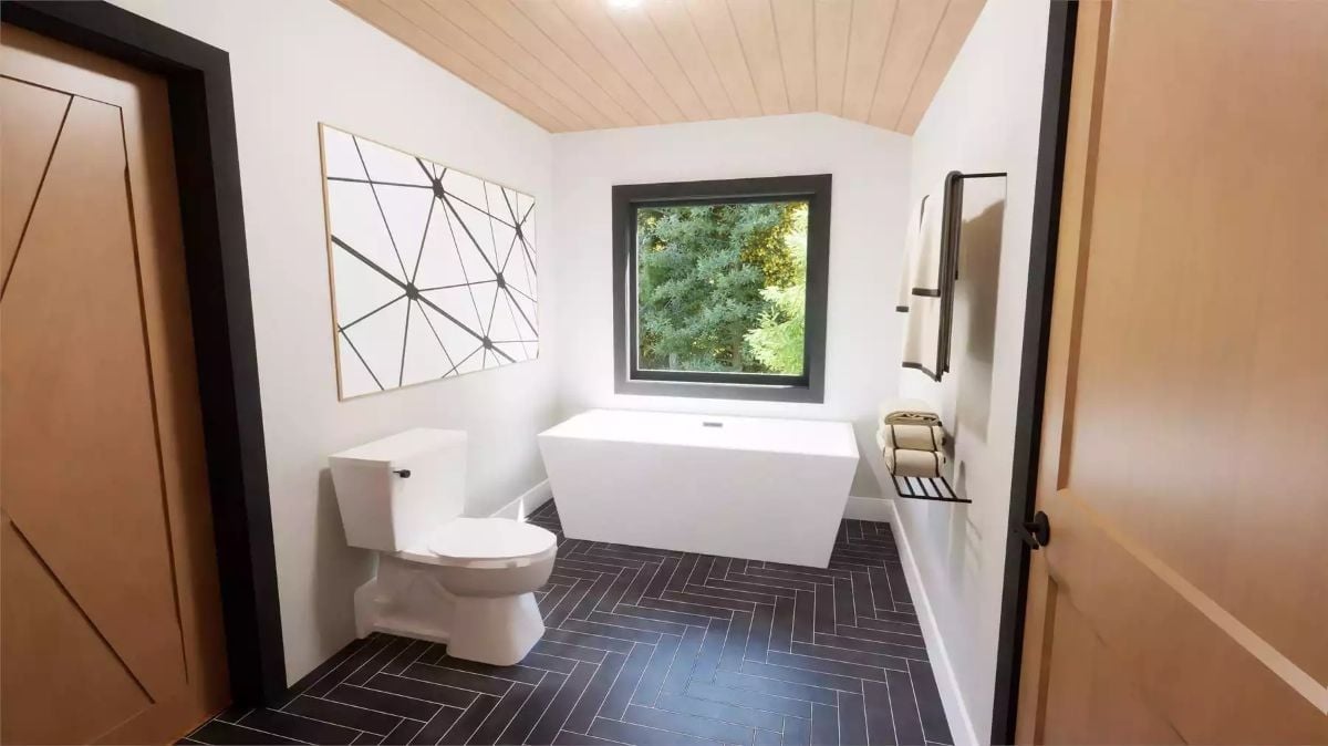 Freestanding Tub Centered on a Window View Makes Bathing Feel Like a Destination