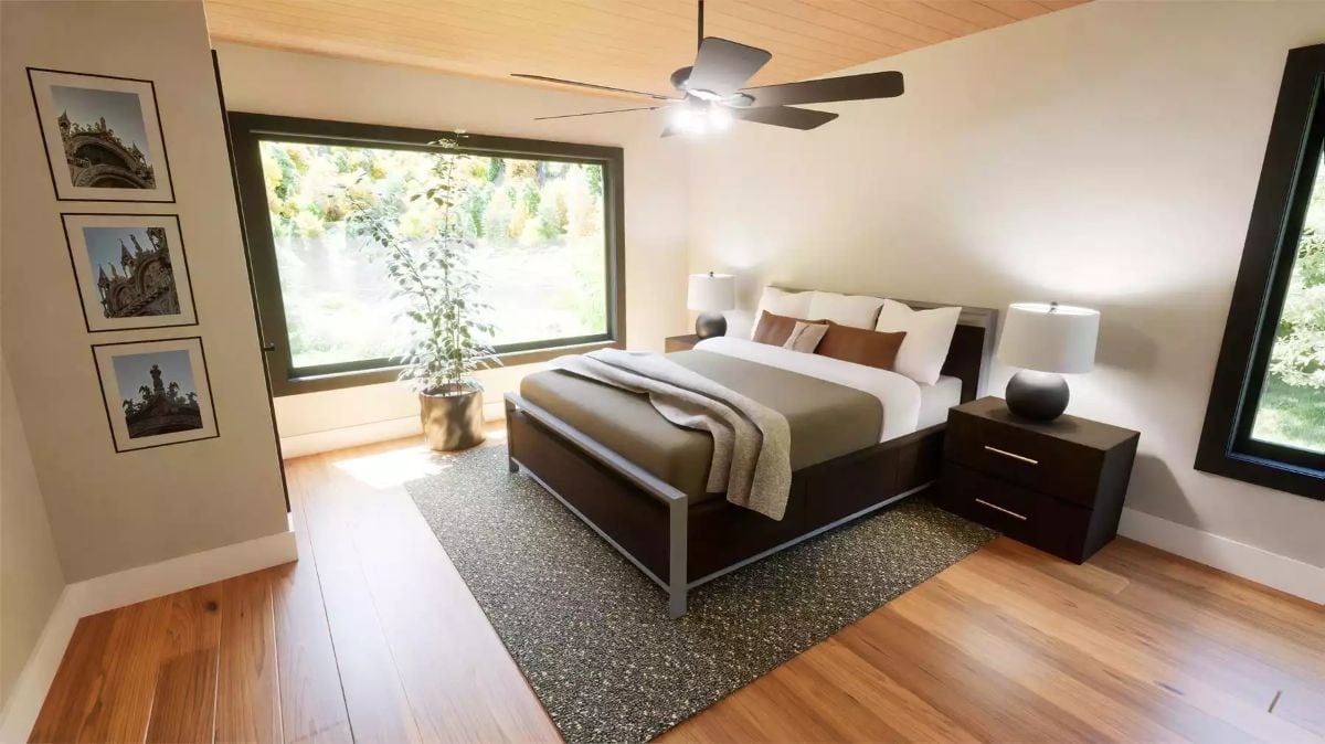 Wood Ceiling, Dark Furniture, and a Picture Window That Does All the Work