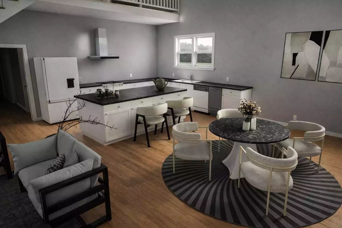 Black Granite, White Cabinets, and a Round Table That Says Stay a While