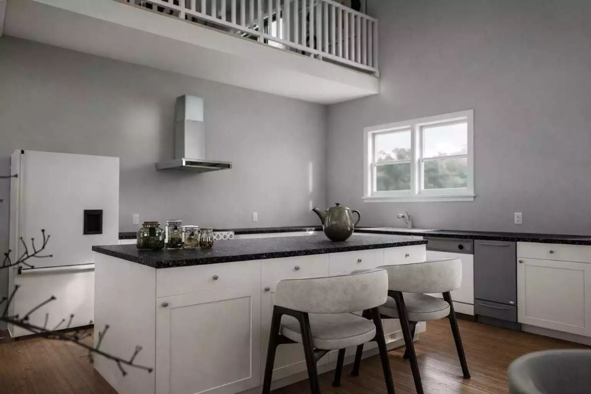 Stainless Hood, Black Granite Island, and a Loft Rail That Overlooks Every Meal