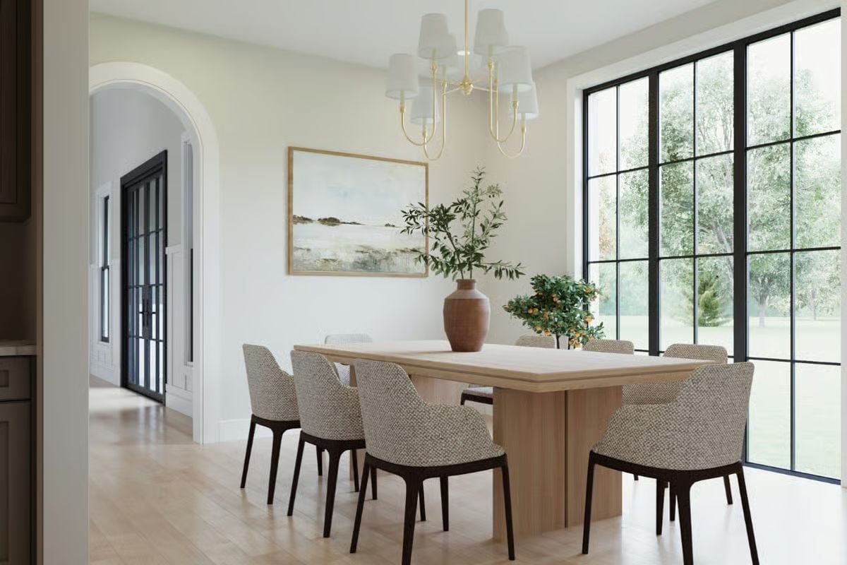 Pale Oak Table, Brass Chandelier, and a Citrus Tree That's Doing Real Work