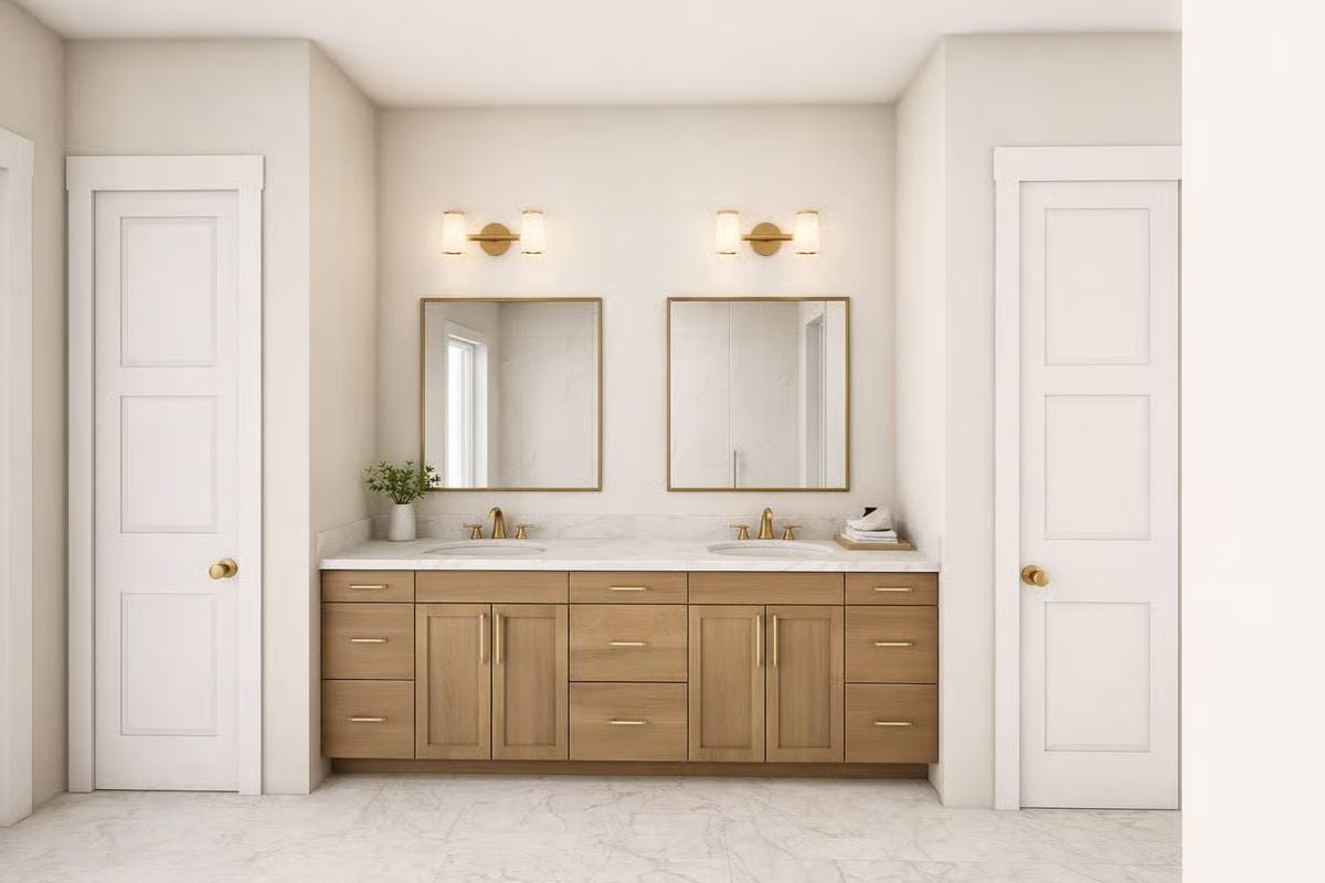 Double Vanity Done Right With Warm Oak and Brushed Gold Hardware