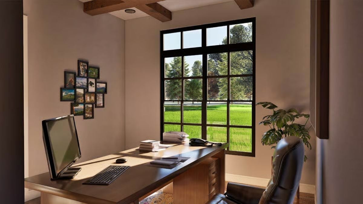 Exposed Ceiling Beams and a Grid Window Frame a Home Office Built to Last