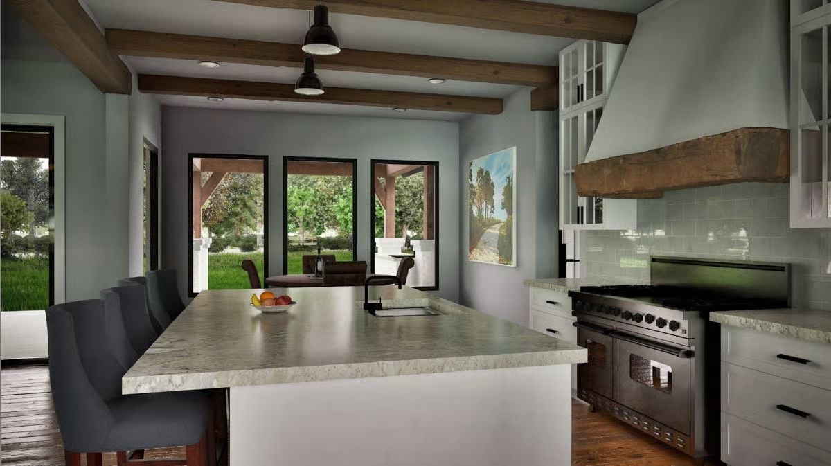 Reclaimed Beam Hood Anchors a Kitchen Built Around the Range
