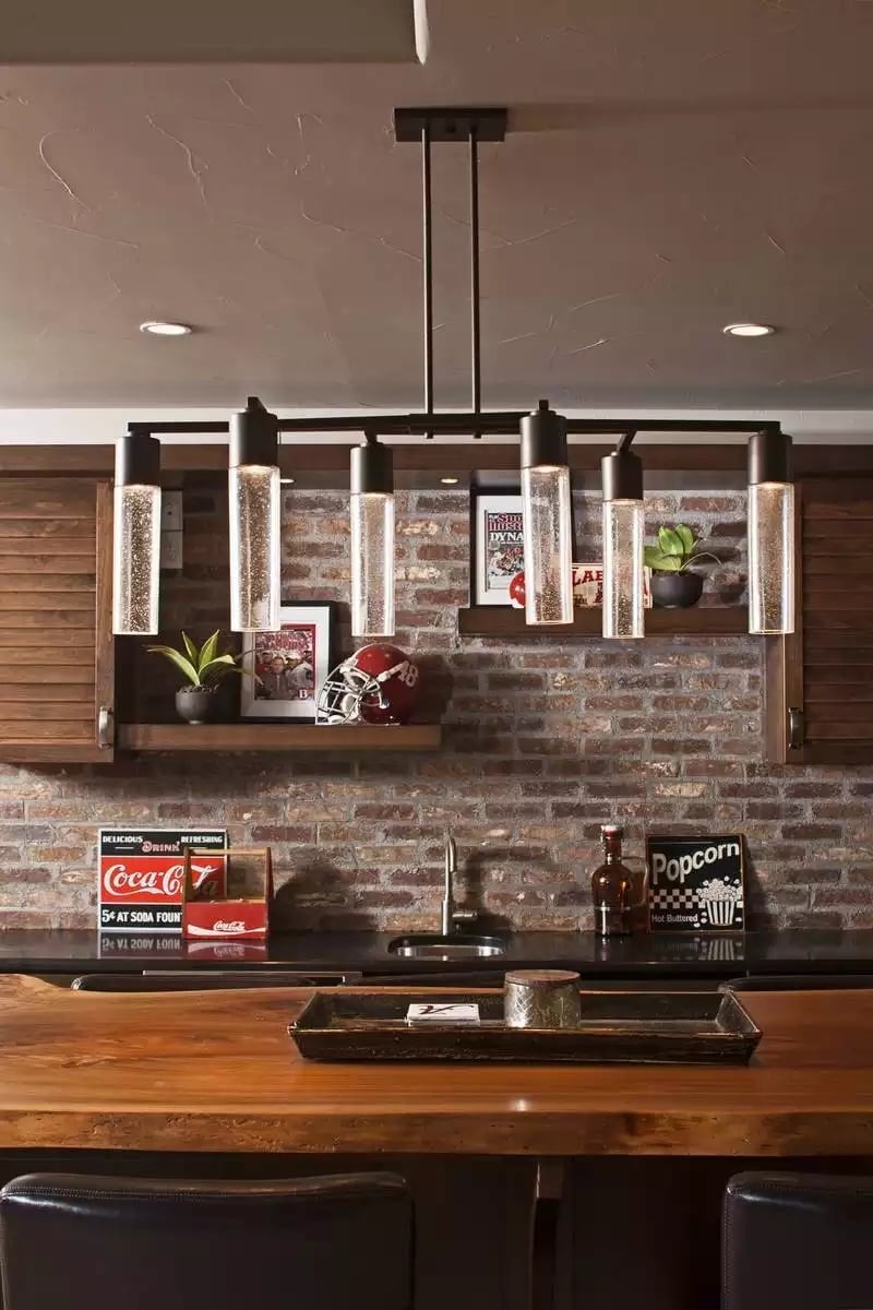 Brick, Bourbon, and a Pendant Light That Earns Its Keep Behind the Bar