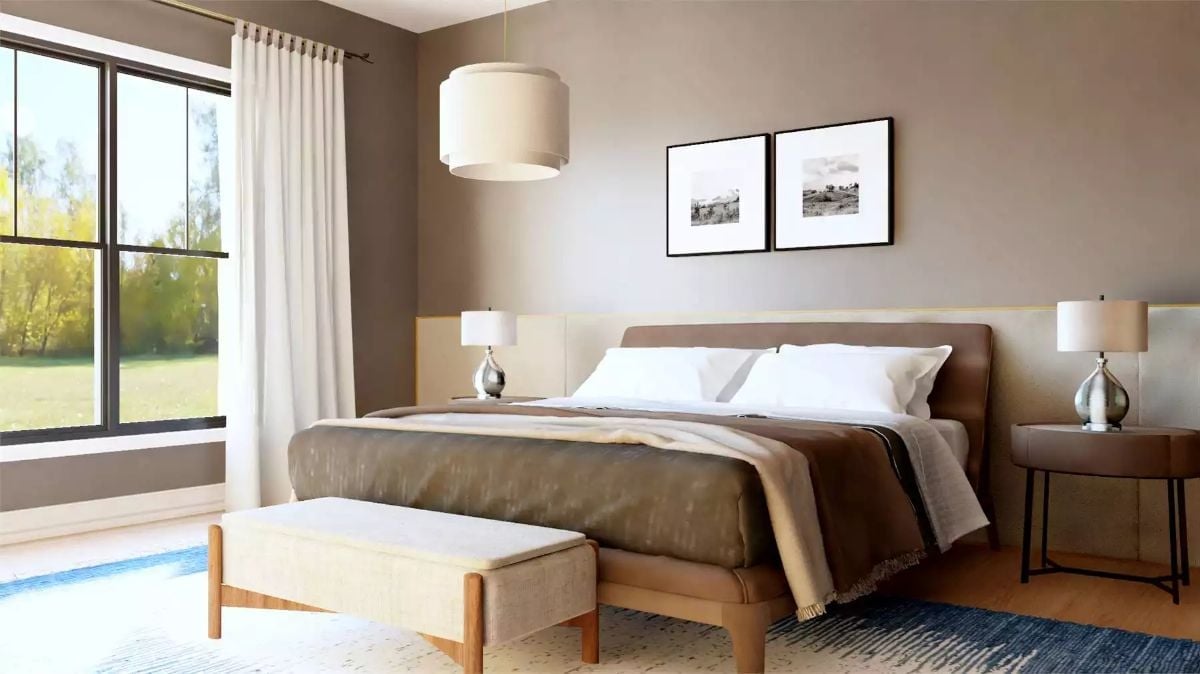Warm Taupe Walls and a Low-Profile Bed Frame Make This Bedroom Feel Earned