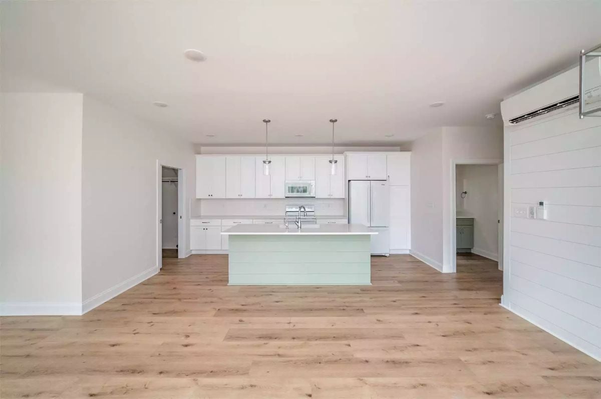 Mint Island Base in an All-White Kitchen That Actually Earns the Contrast