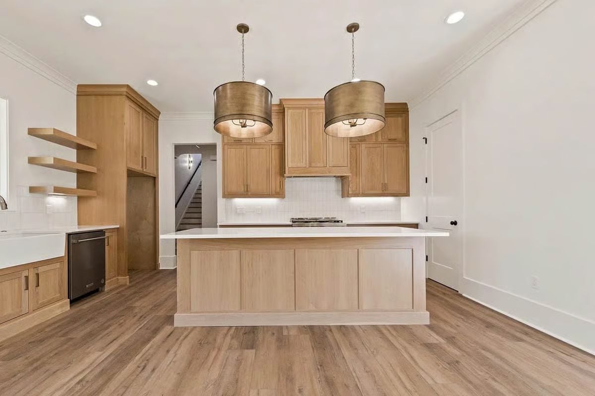 Brass Drum Pendants and Bleached Oak Make a Case for Warm Minimalism