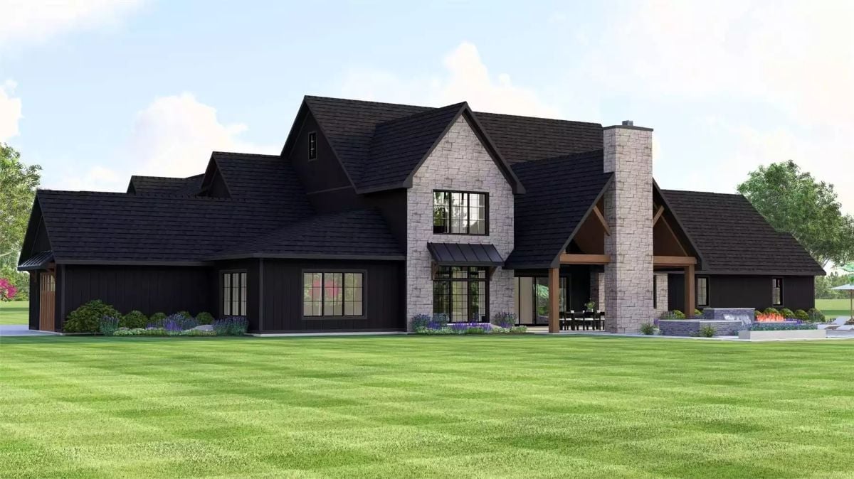 Dark Board-and-Batten Meets Natural Stone on This Sprawling Craftsman Exterior