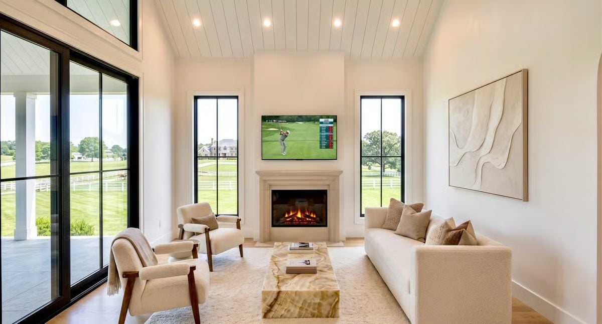 Golf on TV, Fire in the Hearth, Marble Coffee Table Doing the Heavy Lifting