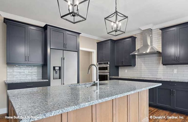 Charcoal Cabinets and Granite That Earns Its Square Footage