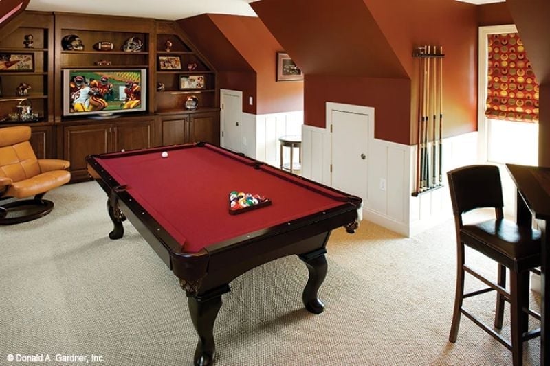 Cue Rack on the Wall, Game on the Screen, Room Ready to Go