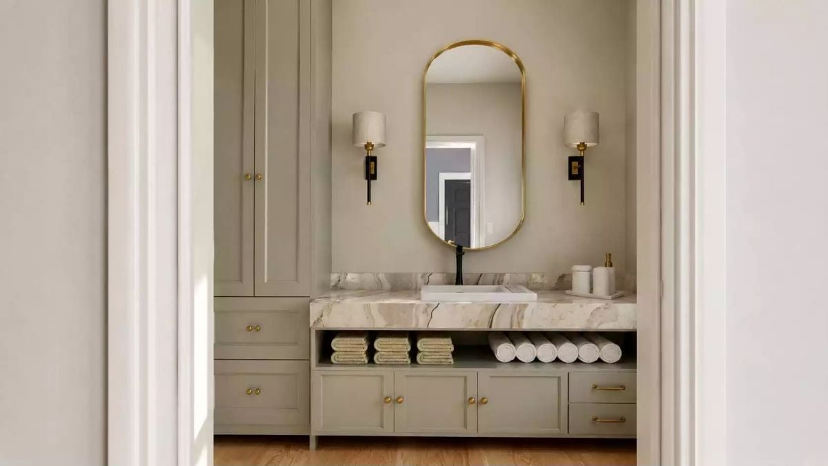 Gold-Framed Mirror, Marble Slab, and Sconces That Earned Their Place
