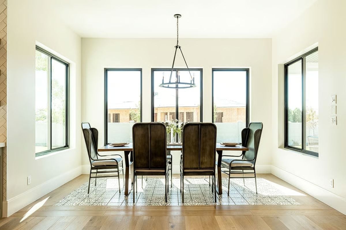 Dark Velvet Chairs and a Tile Inset That Earns Its Place on the Floor