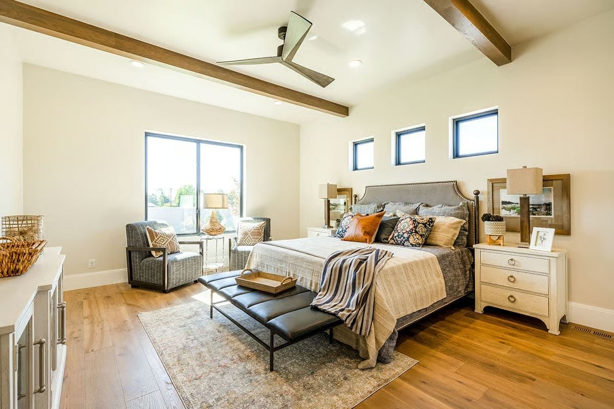 Exposed Ceiling Beams and a Leather Bench That Pulls the Whole Bed Together