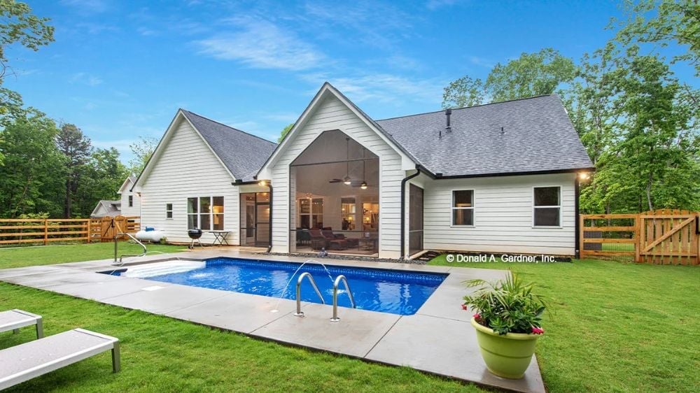 Screened Porch, Pool Deck, and Green Lawn Make the Backyard Hard to Leave