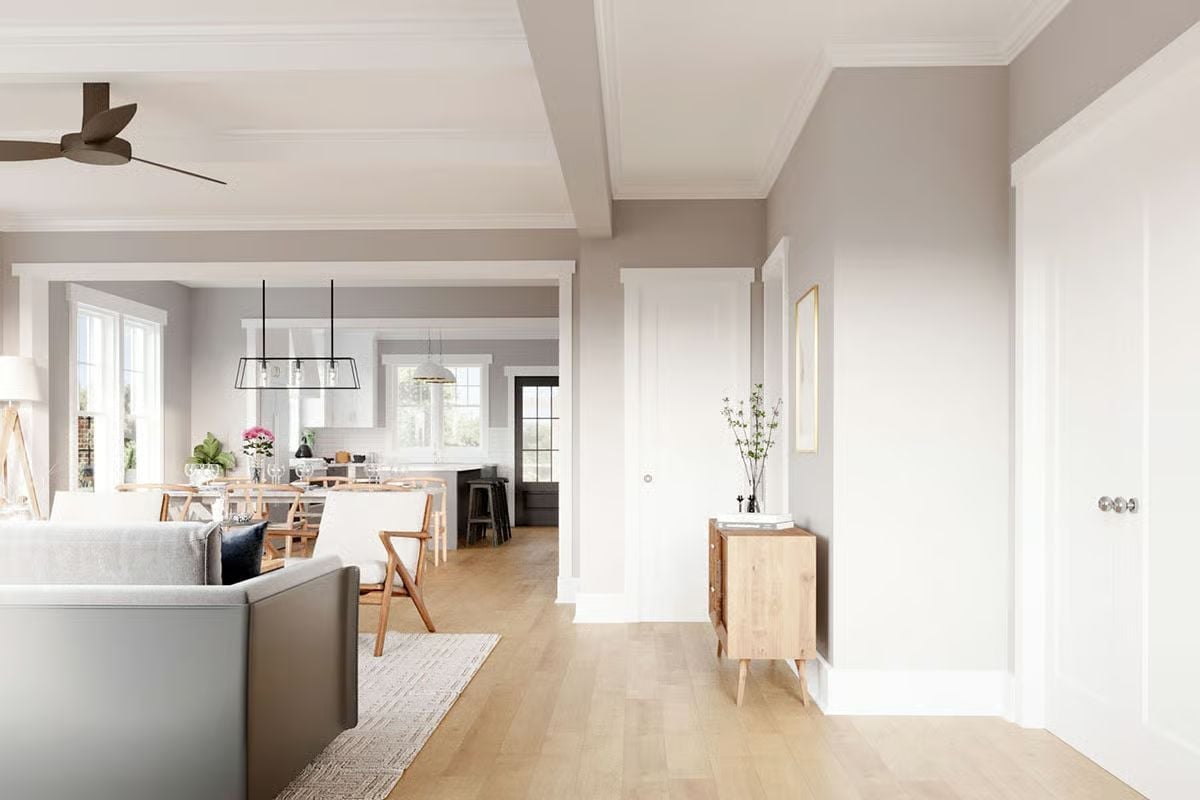 Coffered Ceilings and Light Wood Floors Pull the Open Plan Together