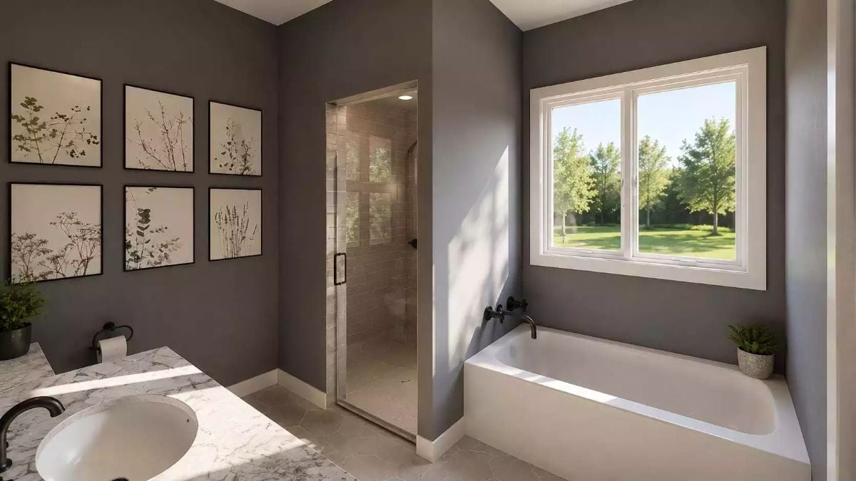 Botanical Prints, Marble Counters, and a Soaking Tub Under Natural Light