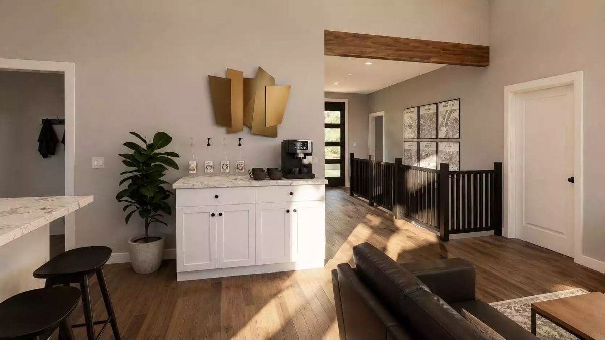 Gold Wall Sculpture, Coffee Bar, and a Beam That Earns Its Place