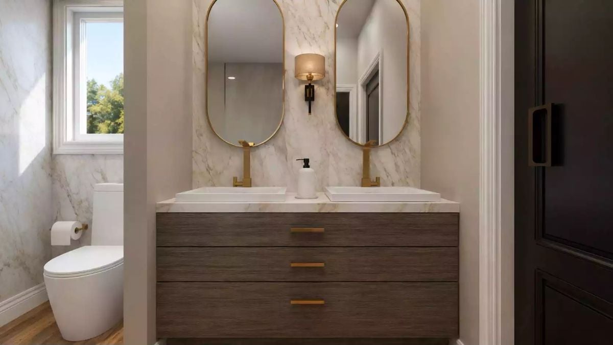 Gold Fixtures, Oval Mirrors, and a Vanity That Doesn't Touch the Floor