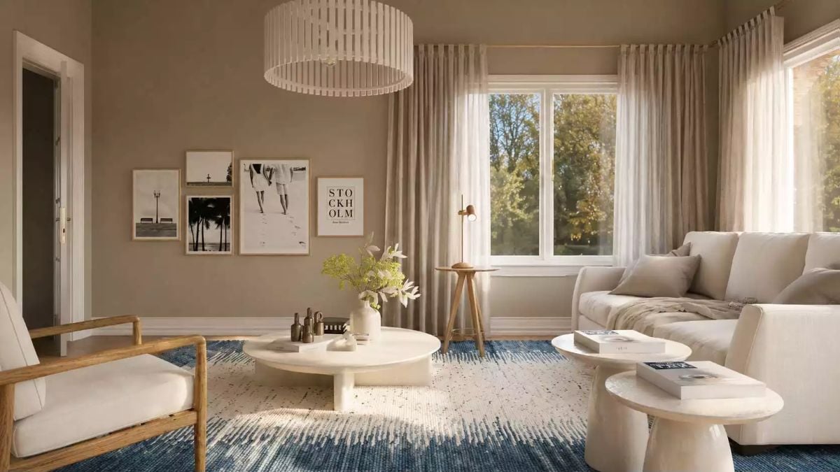 Warm Sand Walls, a Blue Rug, and the Round Coffee Table That Anchors It All