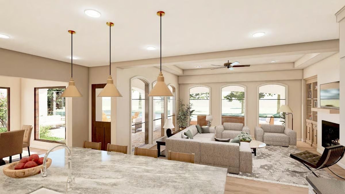 Pendant Lights Over Marble, Arched Windows Beyond — Kitchen to Great Room Done Right